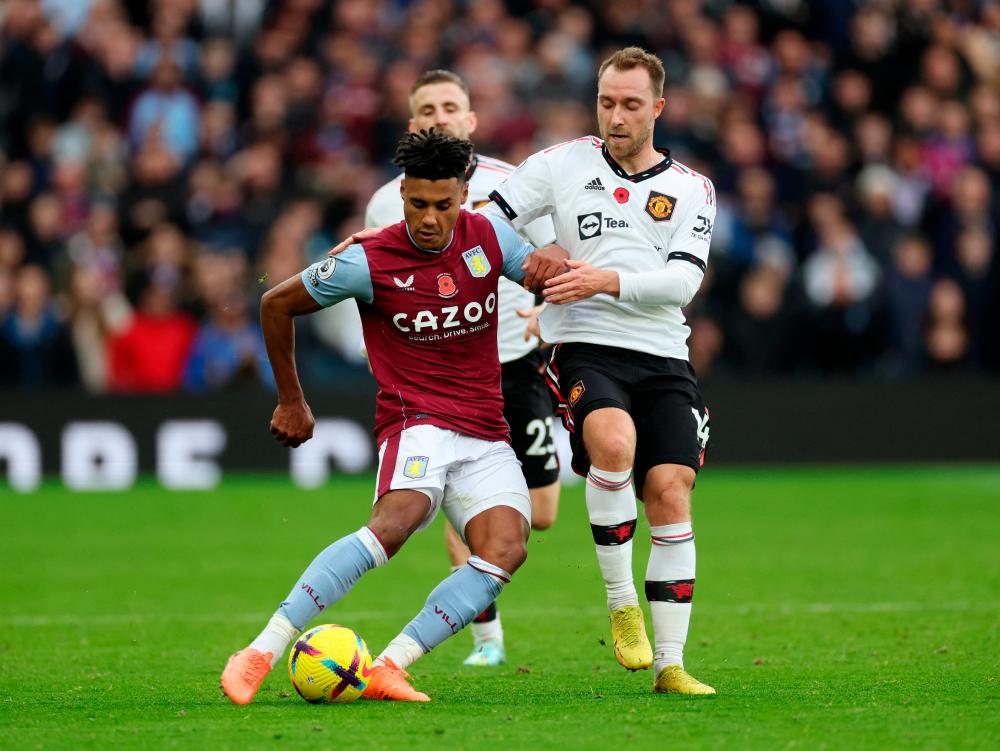 Aston Villa’s Ollie Watkins in action with Manchester United’s Christian Eriksen/REUTERSPix