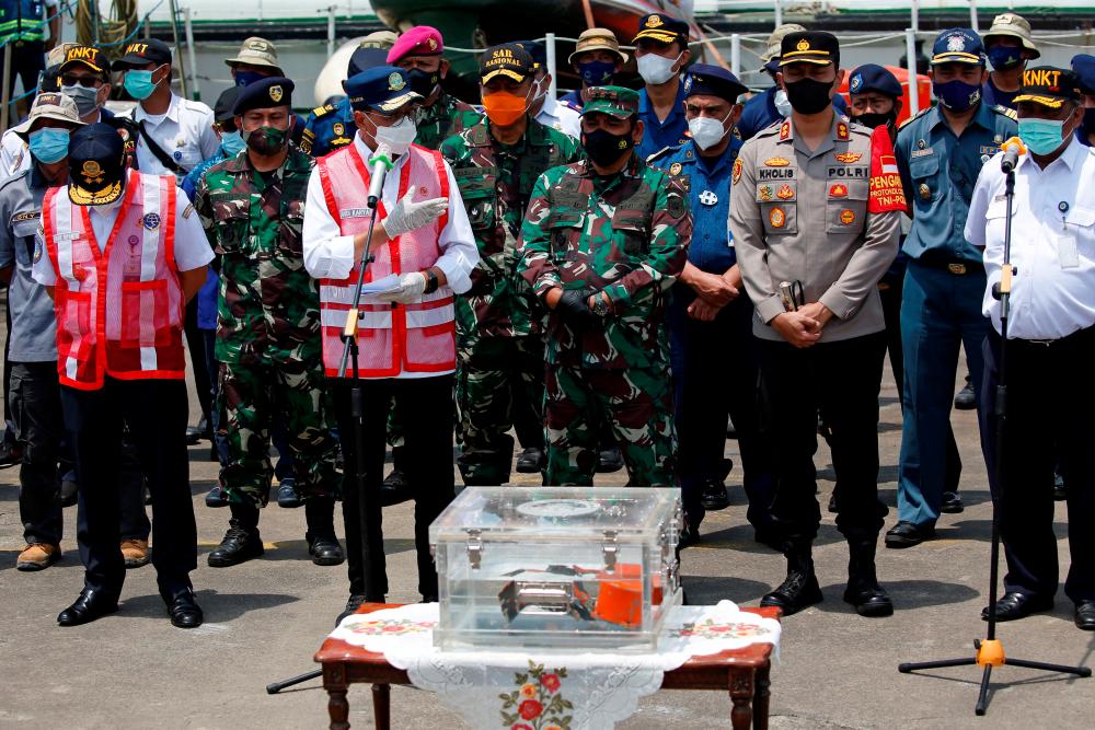 Indonesia’s Transport Minister Budi Karya Sumadi speaks to the media as the Cockpit Voice Recorder (CVR) of Sriwijaya Air flight SJ 182 is displayed at Tanjung Priok Port in Jakarta, Indonesia, March 31, 2021. REUTERSPIX
