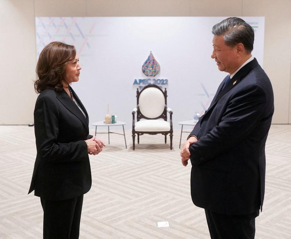 US Vice President Kamala Harris greets China’s President Xi Jinping before the APEC Leaders’ Retreat in Bangkok, Thailand November 19, 2022. REUTERSPIX