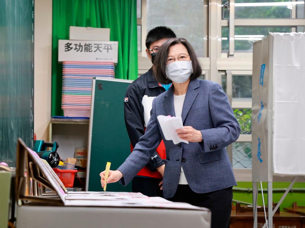 Taiwan President Tsai Ing-wen casts her vote at a polling station during local elections in New Taipei City, Taiwan, November 26, 2022. REUTERSPIX