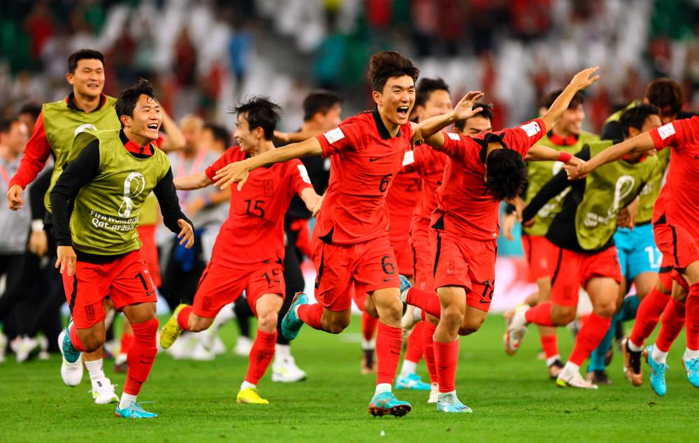 South Korea’s Hwang In-beom celebrates after the match as South Korea qualify for the knockout stages /REUTERSPix