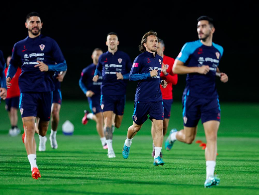 Soccer Football - FIFA World Cup Qatar 2022 - Croatia Training - Al Erssal Training Site 3, Doha, Qatar - December 11, 2022Croatia's Luka Modric during training - REUTERSPIX
