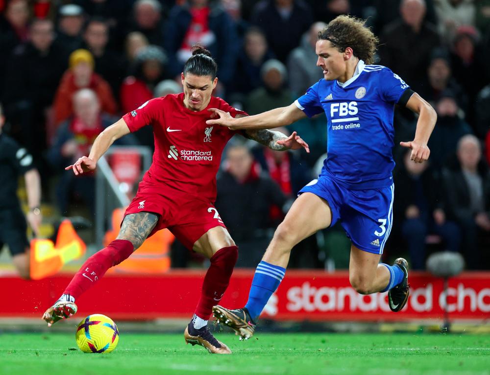 Soccer Football - Premier League - Liverpool v Leicester City - Anfield, Liverpool, Britain - December 30, 2022Liverpool's Darwin Nunez in action with Leicester City's Wout Faes - REUTERSPIX