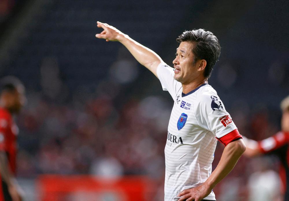 Yokohama FC’s Japanese striker Kazuyoshi Miura who is recognised as the world’s oldest goalscorer and oldest player currently playing in a professional league, gestures during J. League YBC Levain Cup soccer match against Hokkaido Consadole Sapporo in Sapporo, northern Japan August 12, 2020/AFPPix