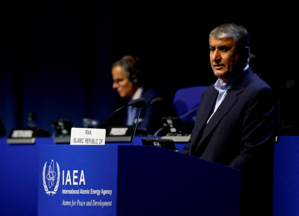 Head of Atomic Energy Organization of Iran Mohammad Eslami and International Atomic Energy Agency Director General Rafael Grossi attend the opening of the IAEA General Conference at their headquarters in Vienna, Austria, September 26, 2022. REUTERSPIX