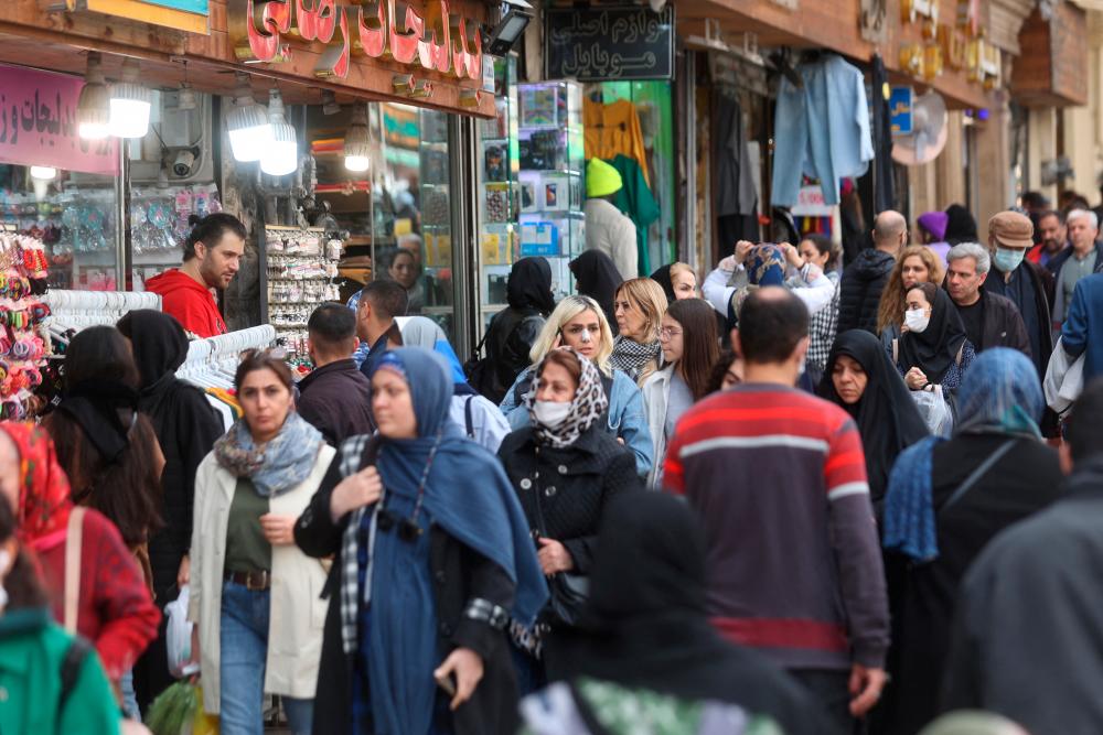 ranian people walk at the Tajrish Bazaar, ahead of Nowruz, the Iranian New Year, in Tehran, Iran March 15, 2023. REUTERSPIX