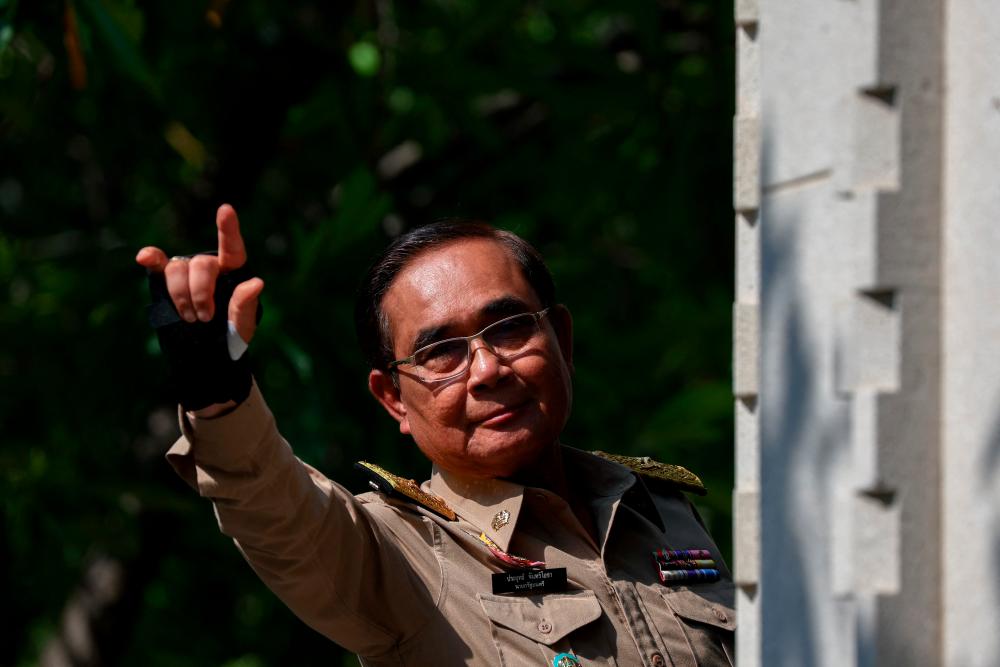 Thailand’s Prime Minister Prayuth Chan-ocha gestures, after Thailand’s King Maha Vajiralongkorn has endorsed a decree to dissolve parliament, at the Government House in Bangkok, Thailand, March 20, 2023. REUTERSPIX