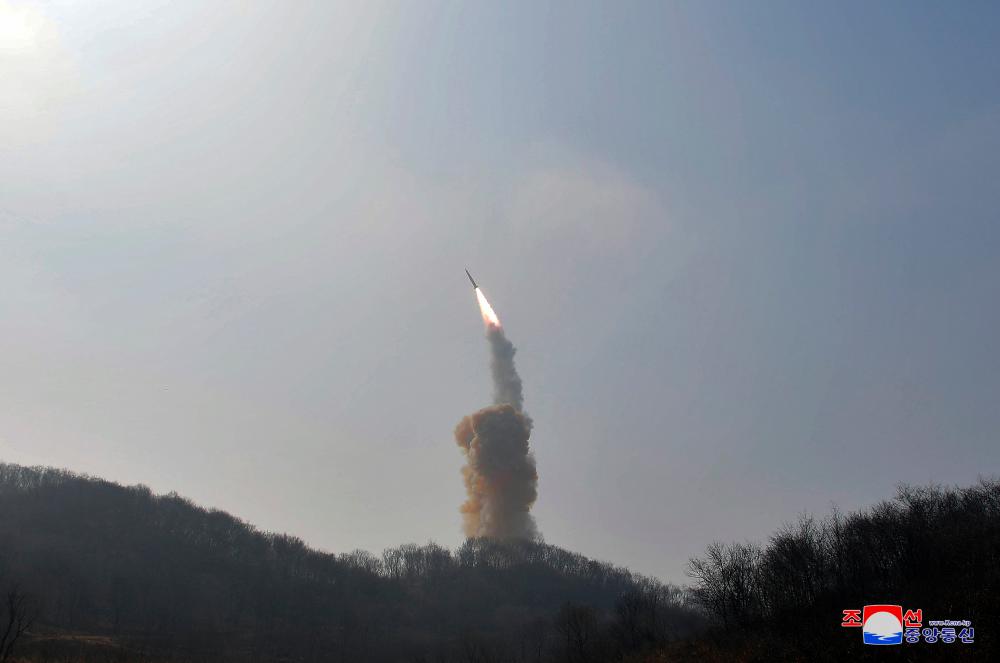 A view shows a missile fired by the North Korean military at an undisclosed location in this image released by North Korea’s Central News Agency (KCNA) on March 20, 2023. REUTERSPIX