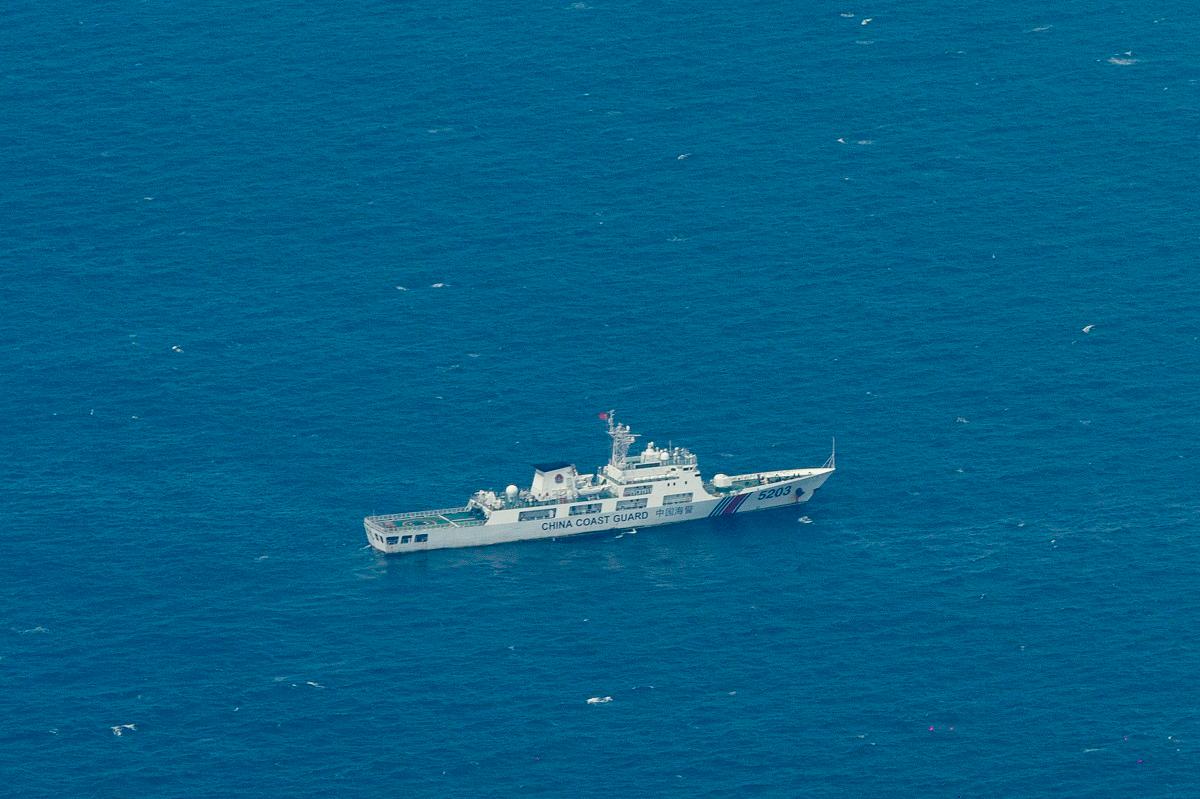 A Chinese Coast Guard vessel is pictured near the Philippine-occupied Thitu Island, in the disputed Spratly Islands, South China Sea, March 9, 2023. - REUTERS/Eloisa Lopez/File Photo