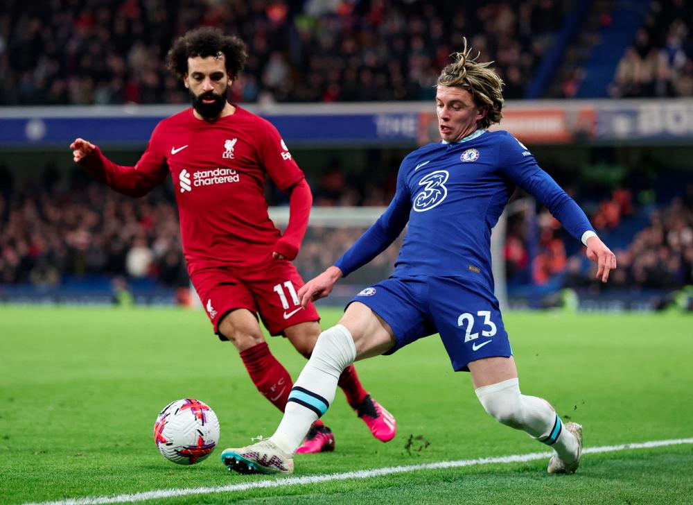 Soccer Football - Premier League - Chelsea v Liverpool - Stamford Bridge, London, Britain - April 4, 2023Chelsea's Conor Gallagher in action with Liverpool's Mohamed Salah - REUTERSPIX