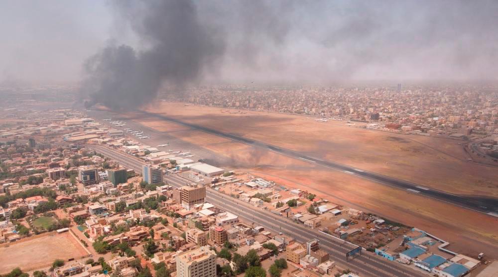 Smoke rises over the city as army and paramilitaries clash in power struggle, in Khartoum, Sudan, April 15, 2023/REUTERSPix