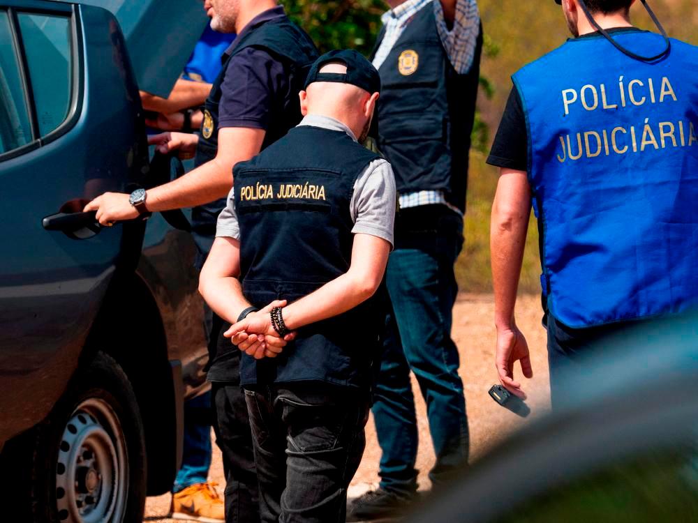 Officers of Portugal’s investigative Judicial Police are seen at the site of a remote reservoir where a new search for the body of Madeleine McCann is set to take place, in Silves, Portugal. REUTERSPIX