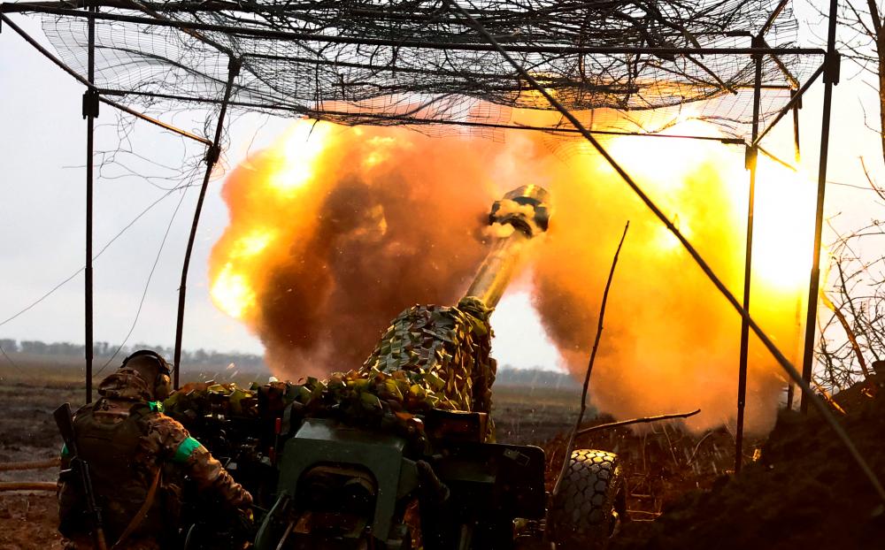 Ukrainian artillery fires towards the frontline during heavy fighting amid Russia’s attack on Ukraine, near Bakhmut, Ukraine, April 13, 2023. REUTERSpix