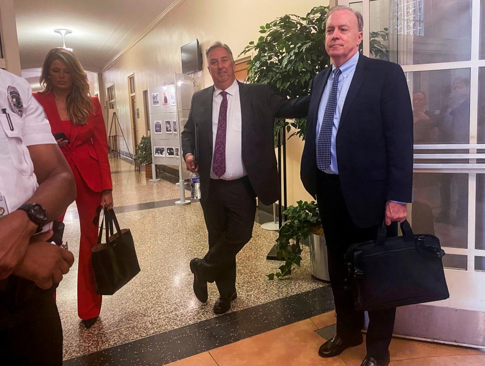 Attorneys for former U.S. President Donald Trump; James Trusty, Lindsey Halligan and John Rowley, depart the U.S. Justice Department after meeting with Justice Department officials over the Trump Mar-a-Lago classified documents case, after Trump’s lawyers last month sent the department a letter asking for a meeting with U.S. Attorney General Merrick Garland, in Washington, U.S. June 5, 2023/REUTERSPix