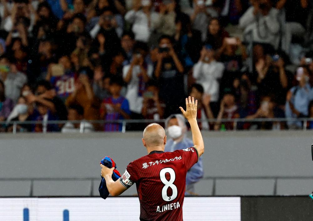 June 6, 2023 Vissel Kobe’s Andres Iniesta waves to the fans as he gets substituted by Haruya Ide. REUTERSPIX