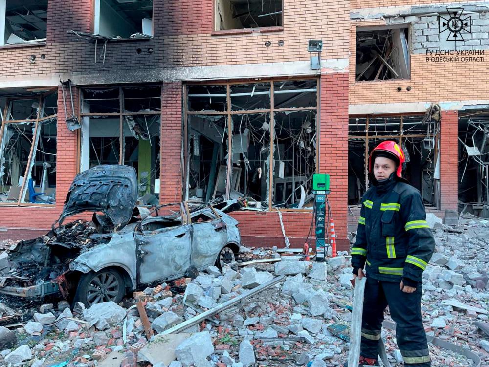 A firefighter is seen at a site of an office building damaged by a Russian missile strike, amid Russia’s attack on Ukraine, in Odesa, Ukraine June 14, 2023. REUTERSPIX