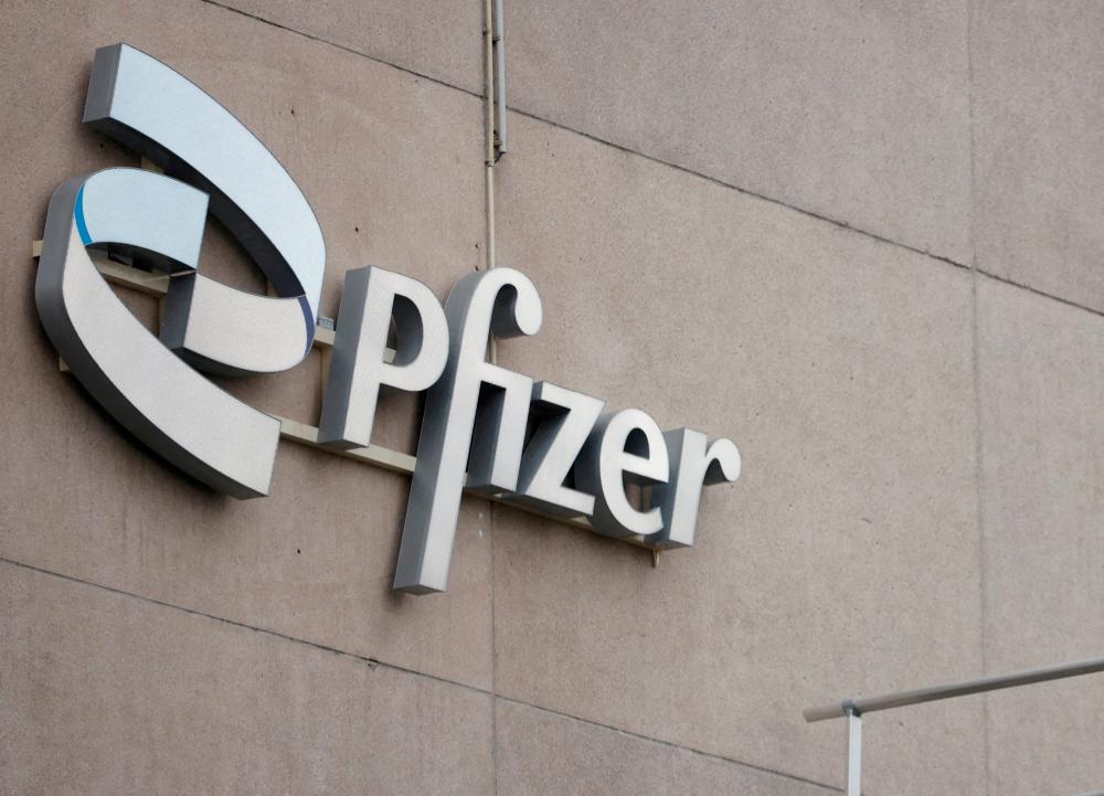 FILE PHOTO: A company logo is seen at a Pfizer office in Puurs, Belgium, December 2, 2022. - REUTERSPIX