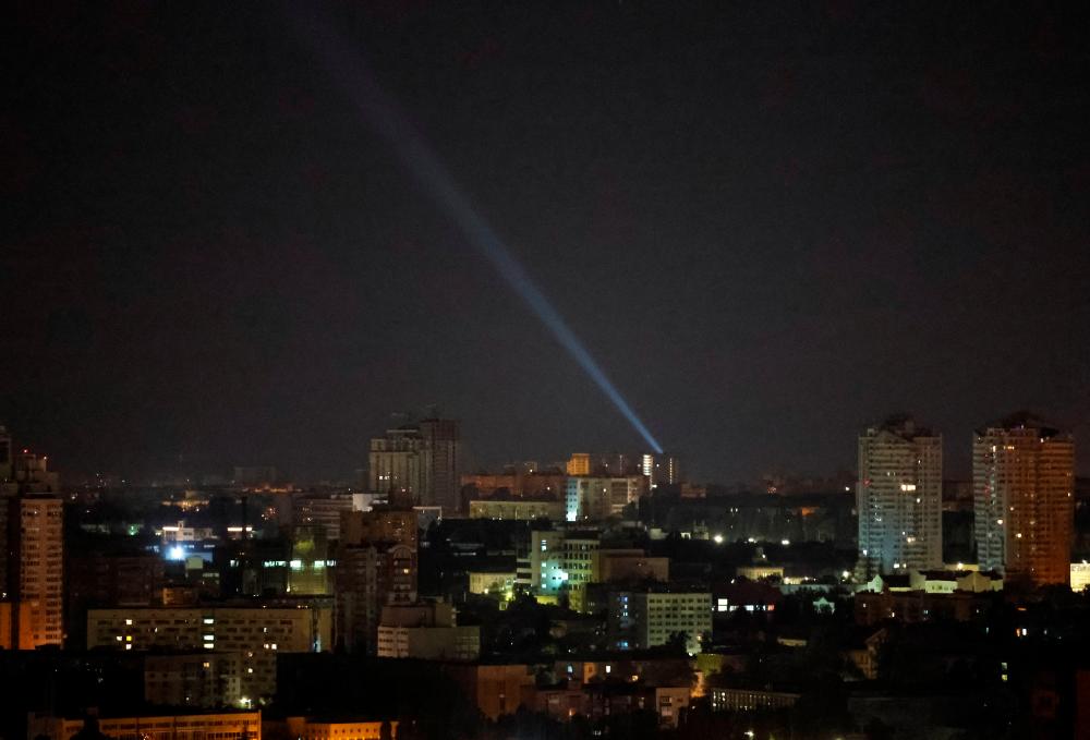 Ukrainian servicemen use a searchlight as they search for drones in the sky over the city during a Russian drone strike, amid Russia’s attack on Ukraine, in Kyiv, Ukraine July 25, 2023. REUTERSpix