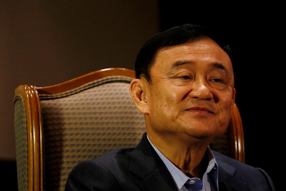 Filepix: Former Thai Prime Minister Thaksin Shinawatra looks on as he speaks to Reuters during an interview in Singapore February 23, 2016/REUTERSPix
