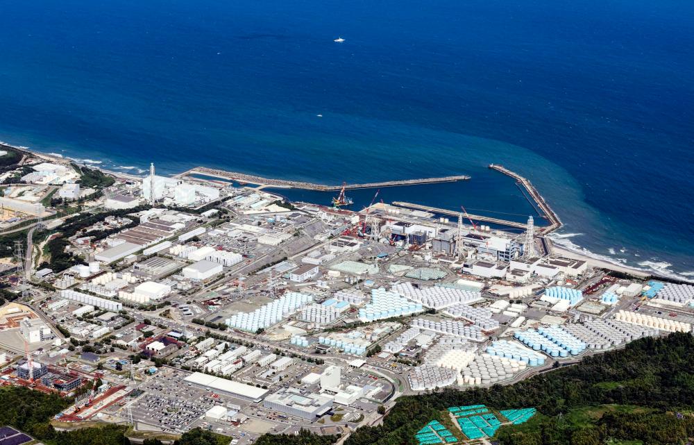 An aerial view shows the Fukushima Daiichi nuclear power plant, which started releasing treated radioactive water into the Pacific Ocean, in Okuma town, Fukushima prefecture, Japan August 24, 2023, in this photo taken by Kyodo/REUTERSPix