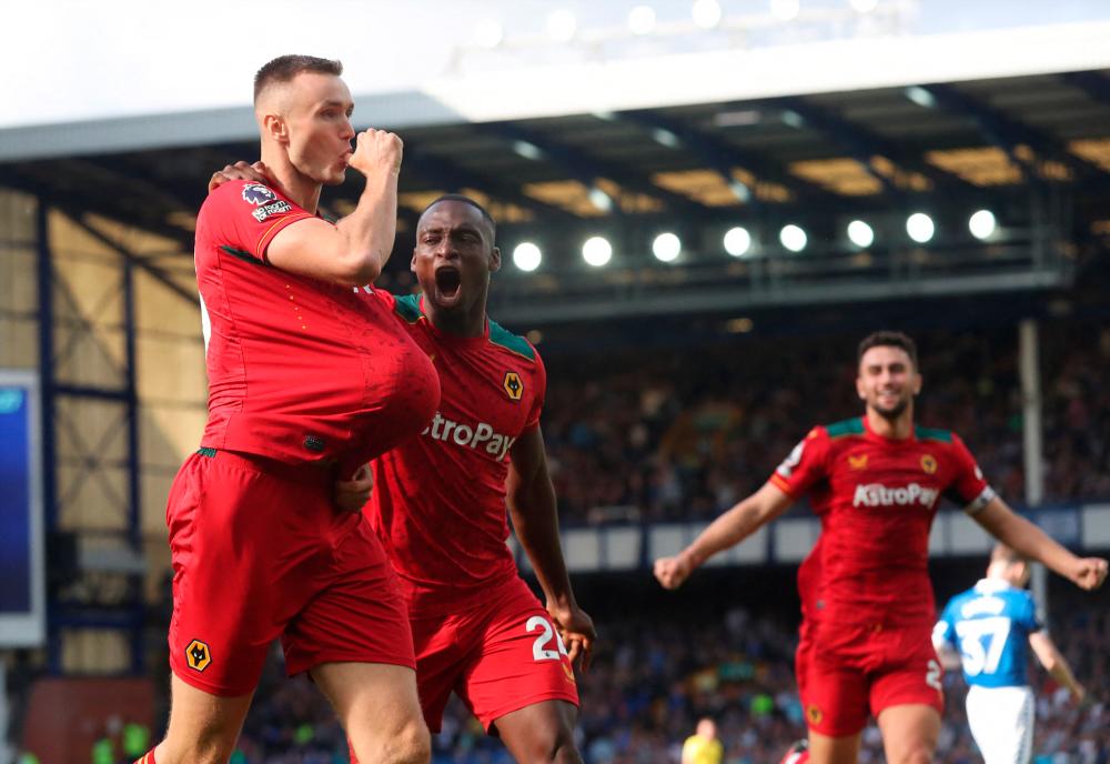 Everton v Wolverhampton Wanderers - Goodison Park, Liverpool, Britain - August 26, 2023 Wolverhampton Wanderers’ Sasa Kalajdzic celebrates scoring their first goal with Toti REUTERSpix
