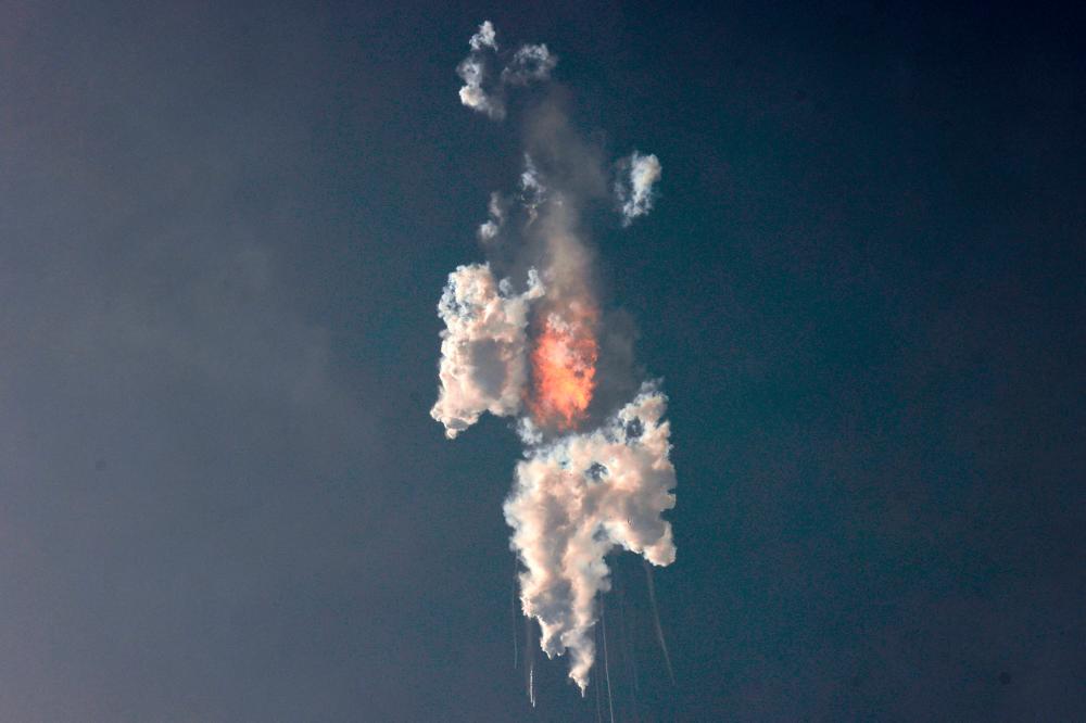 SpaceX's next-generation Starship spacecraft, atop its powerful Super Heavy rocket, explodes after its launch from the company's Boca Chica launchpad on a brief uncrewed test flight near Brownsville, Texas, US April 20, 2023. REUTERSPIX