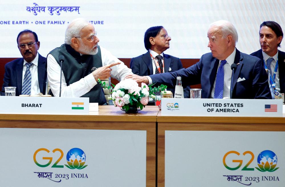 FILE PHOTO: U.S. President Joe Biden and Indian Prime Minister Narendra Modi attend Partnership for Global Infrastructure and Investment event on the day of the G20 summit in New Delhi, India, September 9, 2023. REUTERSPIX