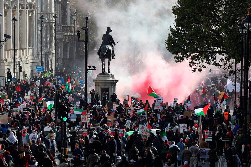 Demonstrators protest in solidarity with Palestinians, amid the ongoing conflict between Israel and the Palestinian Islamist group Hamas, in London, Britain, October 14, 2023. REUTERSpix