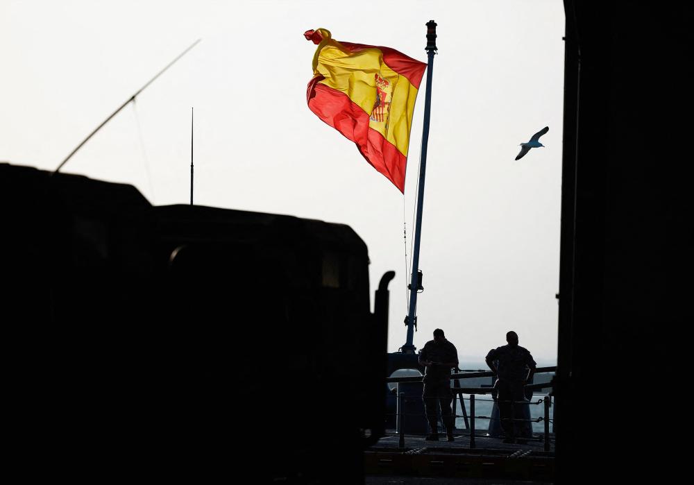 Spanish soldiers stand onboard the assault ship-aircraft carrier LHD Juan Carlos I during Milex 23 military drill in Rota, Spain, October 17, 2023. REUTERSPIX