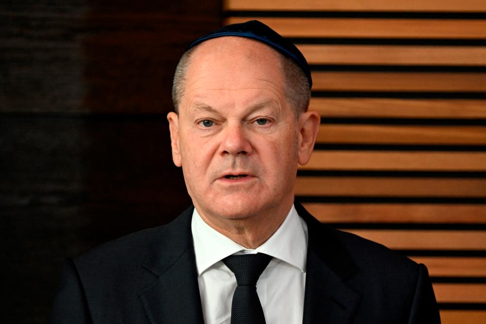 German Chancellor Olaf Scholz speaks during the inauguration of the newly built synagogue in Dessau Rosslau, Germany, October 22, 2023. REUTERSPIX