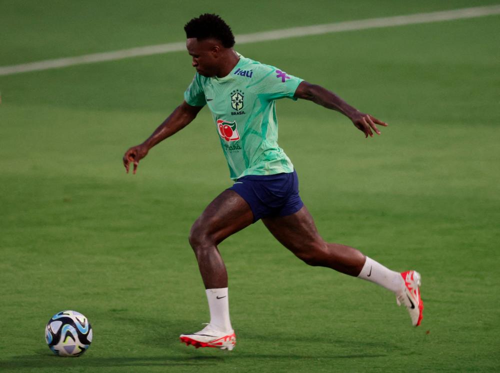 FILE PHOTO: Football - World Cup - South American Qualifiers - Brazil Training - Granja Comary, Teresopolis, Brazil - November 14, 2023 Brazil's Vinicius Junior during training - REUTERSPIX