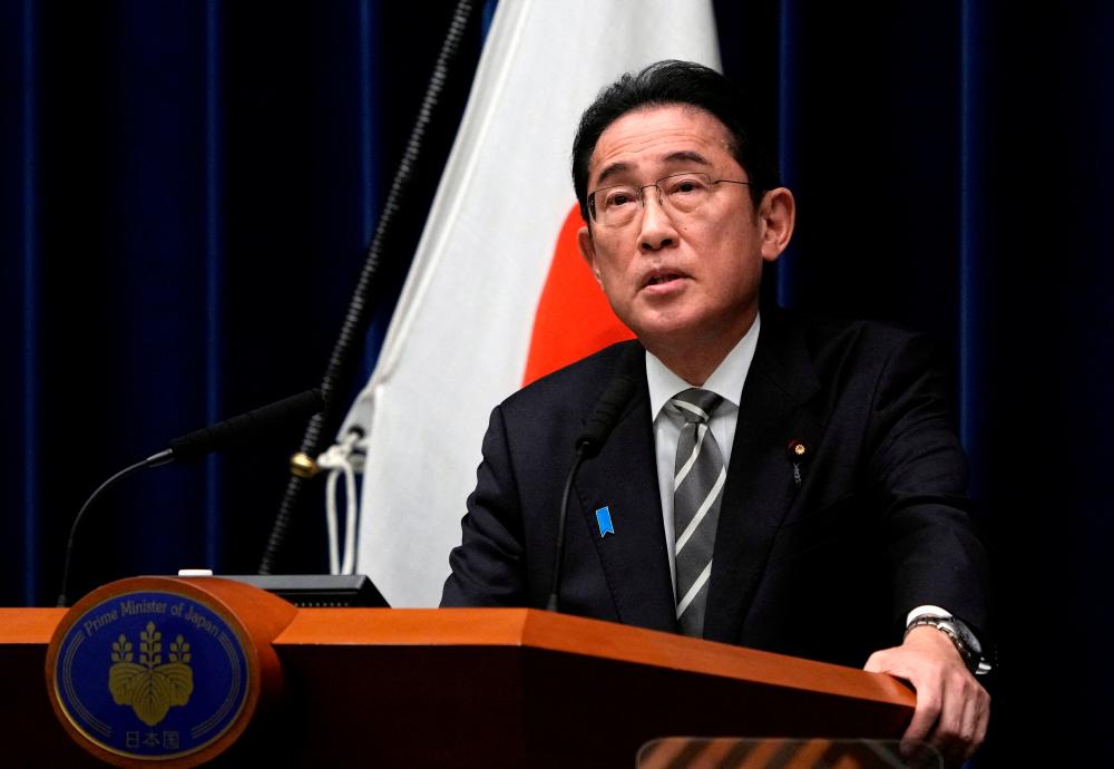 Japanese Prime Minister Fumio Kishida speaks during a news conference at the prime minister's office in Tokyo, Japan. Prime Minister Kishida said he will replace several ministers implicated in a political fundraising scandal. - REUTERSPIX