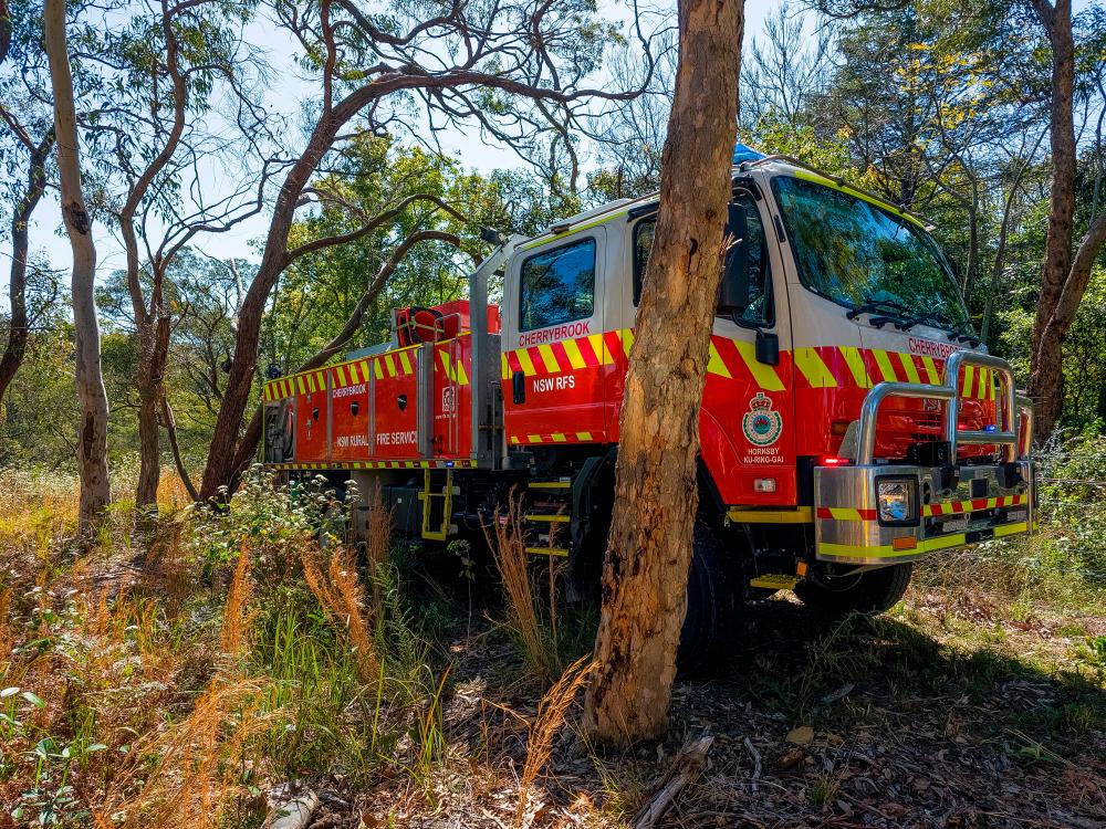 FILE PHOTO: New South Wales Rural Fire Service firetruck is seen at a hazard reduction burn site in Sydney, Australia, September 10, 2023. - REUTERSPIX