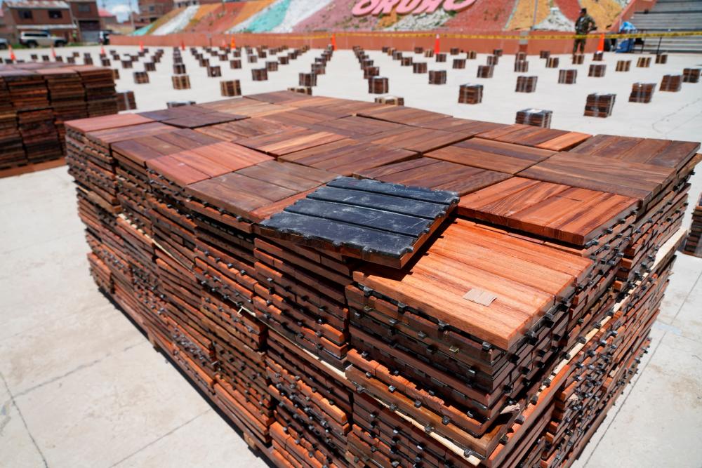 Drugs hidden in wooden flooring materials found in a truck are displayed to the media, in Oruro, Bolivia, January 5, 2024/AFPPix