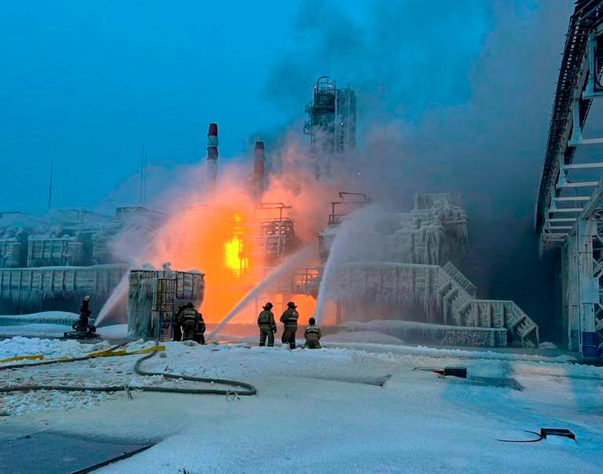 Firefighters work to extinguish fire at the Novatek terminal in the port of Ust-Luga, Russia, January 21, 2024. Leningrad Region's Governor Alexander Drozdenko Telegram channel via REUTERS