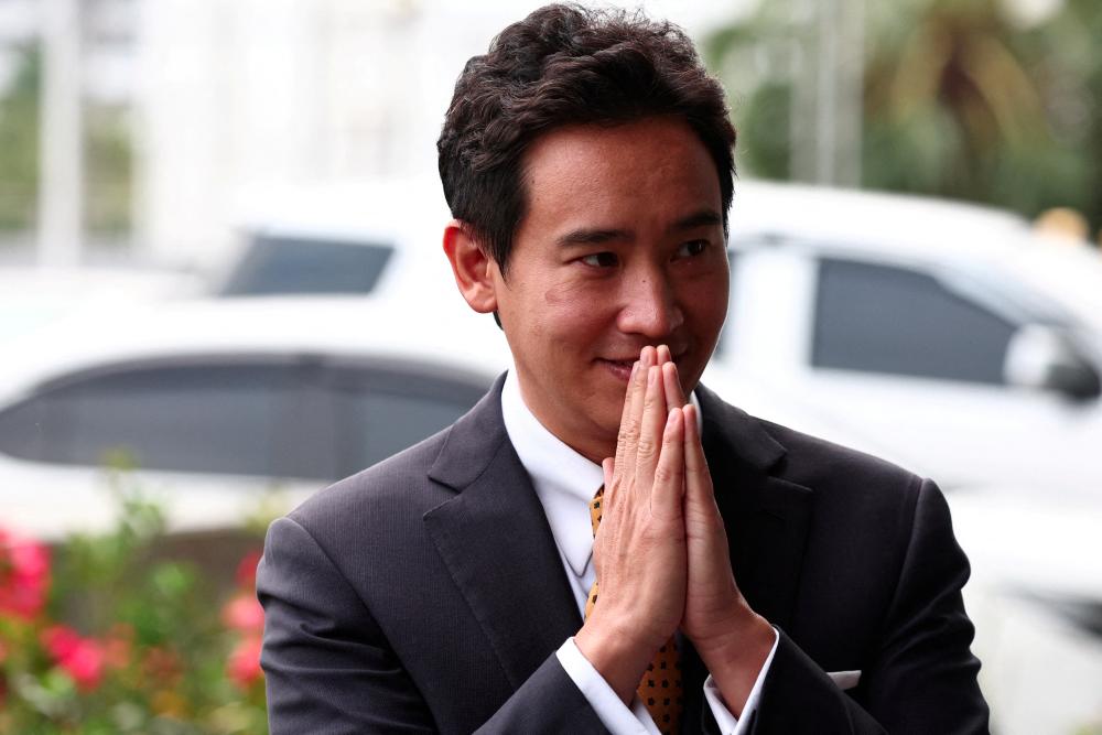 Former Move Forward Party leader Pita Limjaroenrat gestures on the day Thailand's Constitutional Court delivers its verdict on his media shareholding case, in Bangkok, Thailand, January 24, 2024. - REUTERSPIX