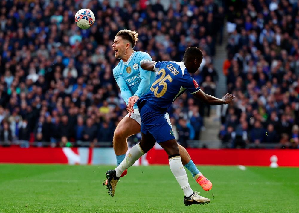 Football - FA Cup - Semi Final - Manchester City v Chelsea - Wembley Stadium, London, Britain - April 20, 2024Manchester City's Jack Grealish in action with Chelsea's Moises Caicedo - REUTERSPIX