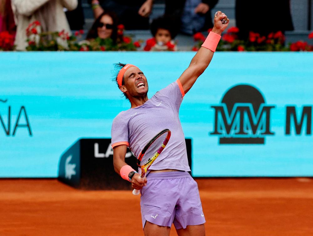 Park Manzanares, Madrid, Spain - April 29, 2024 Spain’s Rafael Nadal celebrates after winning his round of 32 match against Argentina’s Pedro Cachin/REUTERSPix