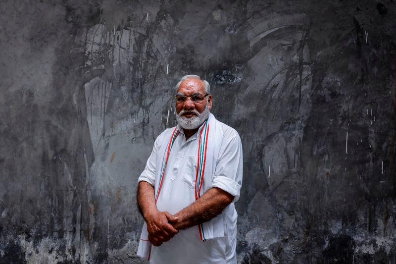 Rashid Ahmed, 60, an electric rickshaw driver and look-alike of Indian Prime Minister Narendra Modi - REUTERSpix