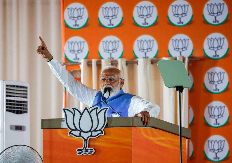 India’s Prime Minister Narendra Modi gestures as he addresses supporters during an election campaign rally - REUTERSpix