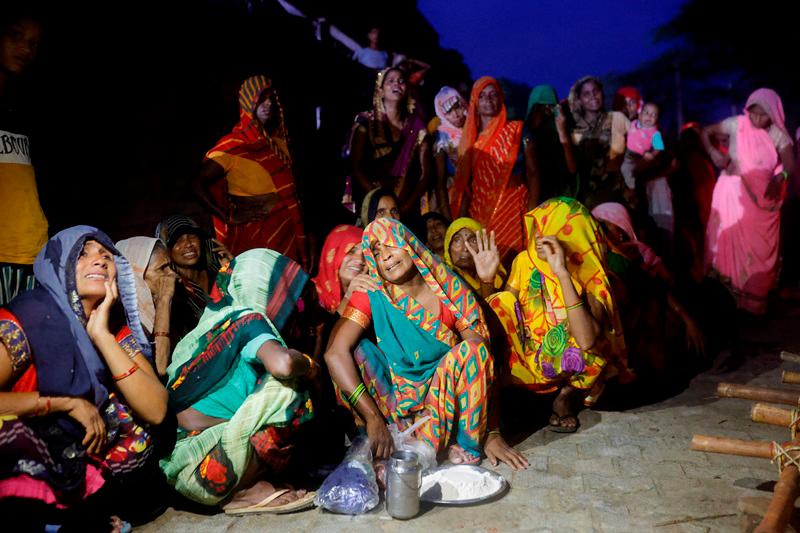 FILE PHOTO: Relatives mourn the death of stampede victims Kamlesh Jatav, 22, and her seven-month-old daughter in Daunkeli village, Hathras district, in the northern state of Uttar Pradesh, India, July 3, 2024. - REUTERSpix