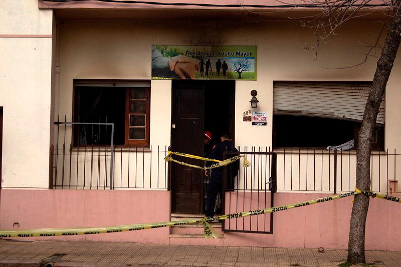 Yellow tape surrounds a nursing home where people died during a fire in Treinta y Tres, Uruguay July 7, 2024. REUTERSpix