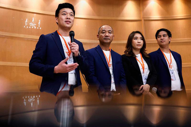 People's Party leader, Natthaphong Ruengpanyawut speaks during a press conference, announcing a new political party following opposition Move Forward Party dissolution in Bangkok, Thailand, August 9, 2024. - REUTERS/Chalinee Thirasupa