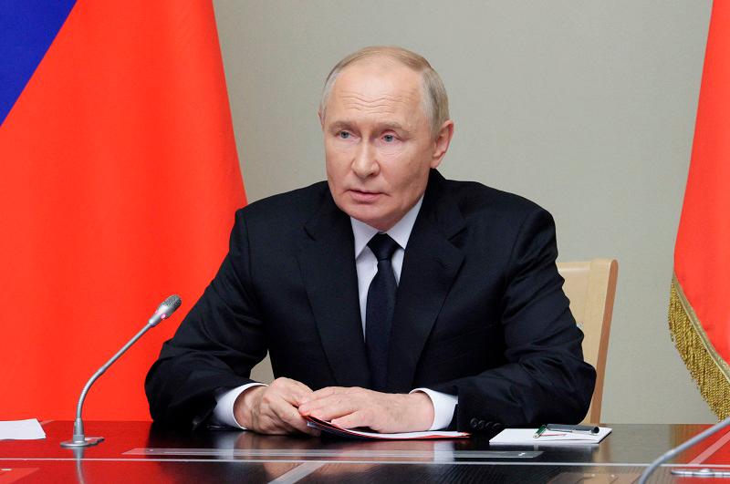 Russia’s President Vladimir Putin chairs a meeting with members of the Security Council at a residence outside Moscow, Russia August 16, 2024. - Sputnik/Alexei Babushkin/Kremlin via REUTERS