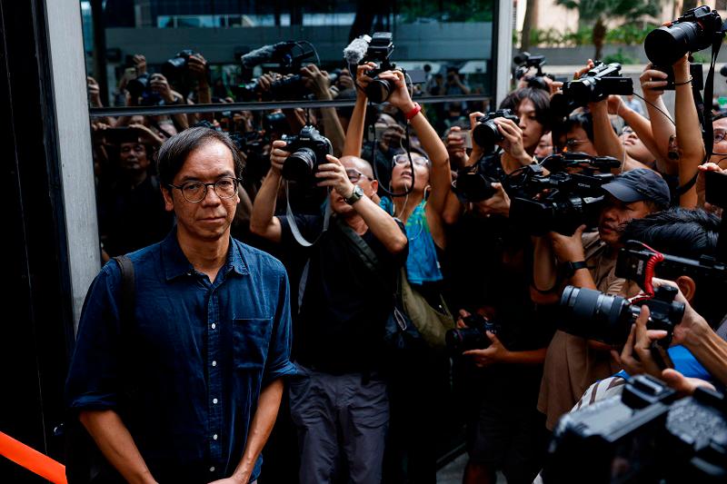 Chung Pui-kuen, former chief editor of the now-shuttered Stand News, leaves the district court on bail after the verdict in a landmark sedition trial against two former editors of the now-defunct media outlet, in Hong Kong, China, August 29, 2024. - REUTERS/Tyrone Siu