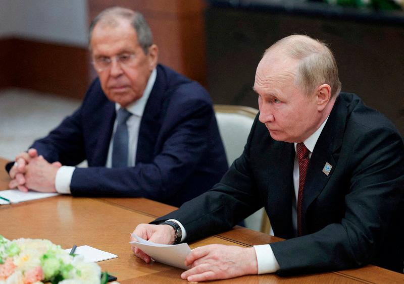 Russian President Vladimir Putin and Foreign Minister Sergei Lavrov at a meeting on the sidelines of Shanghai Cooperation Organization summit in Astana, Kazakhstan July 4, 2024. - Sputnik/Gavriil Grigorov/Pool via REUTERS