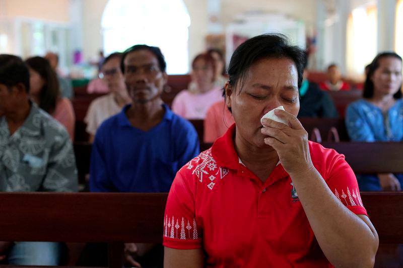 Wiwwaro Sriaoun, 53, a mother of a remaining Thai hostage captured by Hamas, Watchara Sriaoun, attends Sunday church service, in Kut Yang village, Udon Thani province, Thailand, October 6, 2024. - REUTERSPIX