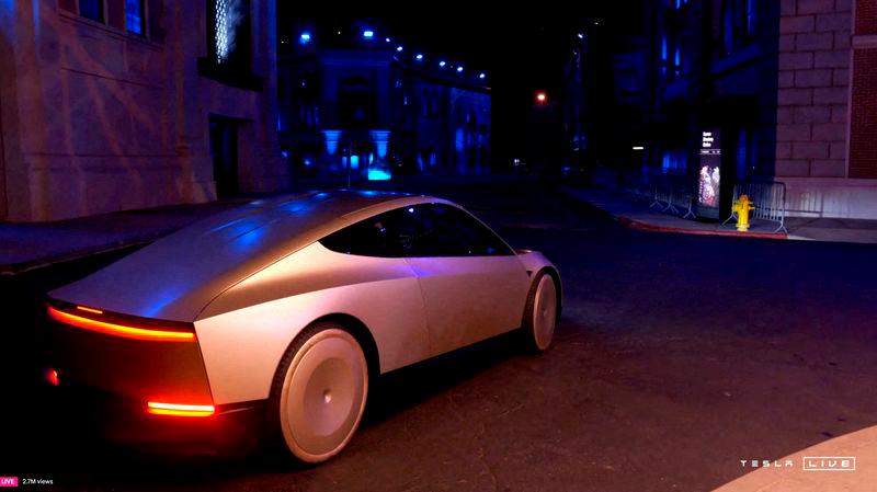 Tesla CEO and X owner Elon Musk rides in Tesla’s robotaxi at an unveilling event in Los Angeles, California. REUTERS