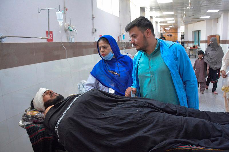 A labourer, who along with others was injured after gunmen attacked a cluster of small private coal mines, receives medical assistance in the Trauma Centre at the Civil Hospital in Quetta, Pakistan October 11, 2024. - REUTERS/Mazhar Ali