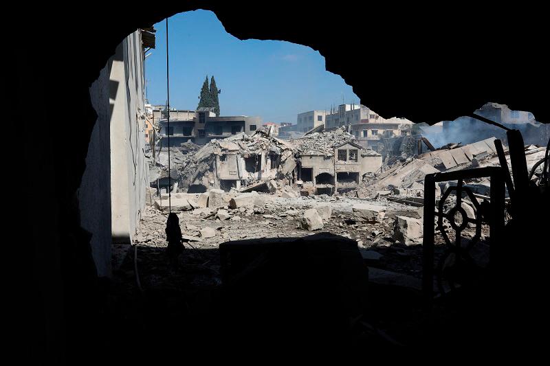 A view shows damage in the aftermath of what security sources said was an Israeli strike on a commercial market, amid the ongoing hostilities between Hezbollah and Israeli forces, in Nabatieh, southern Lebanon, October 13, 2024. - REUTERS/Mohammed Yassin